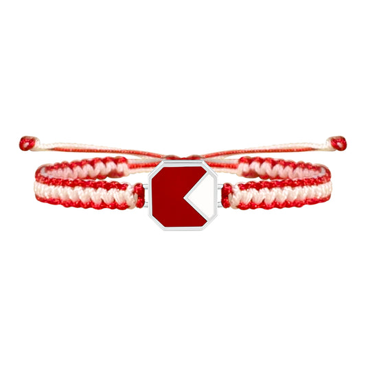 Red and white braided bracelet with a fine metal charm jewellery